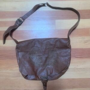 plant-dyed animal leather, studded winged, shoulder bag from Fez, Morocco